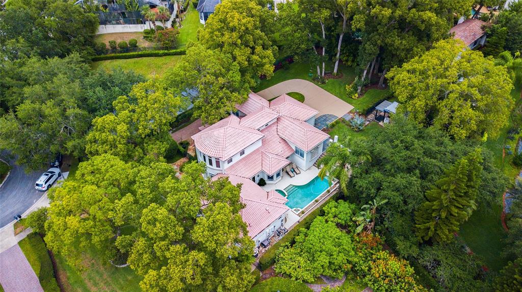 248 Maison Court Altamonte Springs, FL 32714 - Photo 3 of 47 an aerial view of a house with a garden