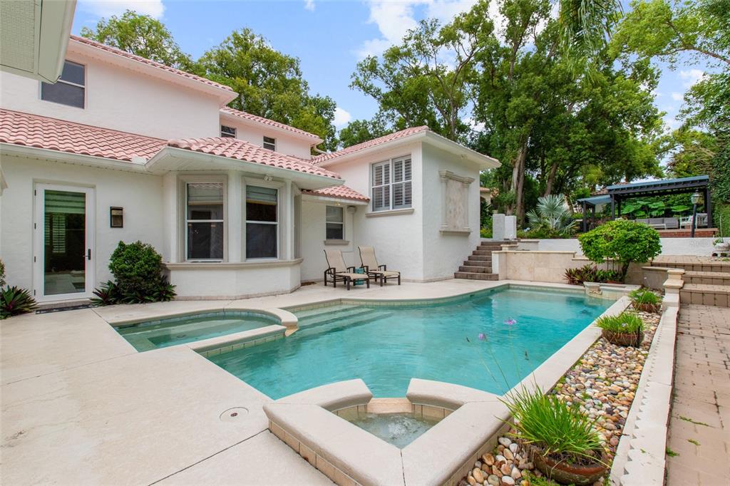 248 Maison Court Altamonte Springs, FL 32714 - Photo 36 of 47 a front view of a house with garden