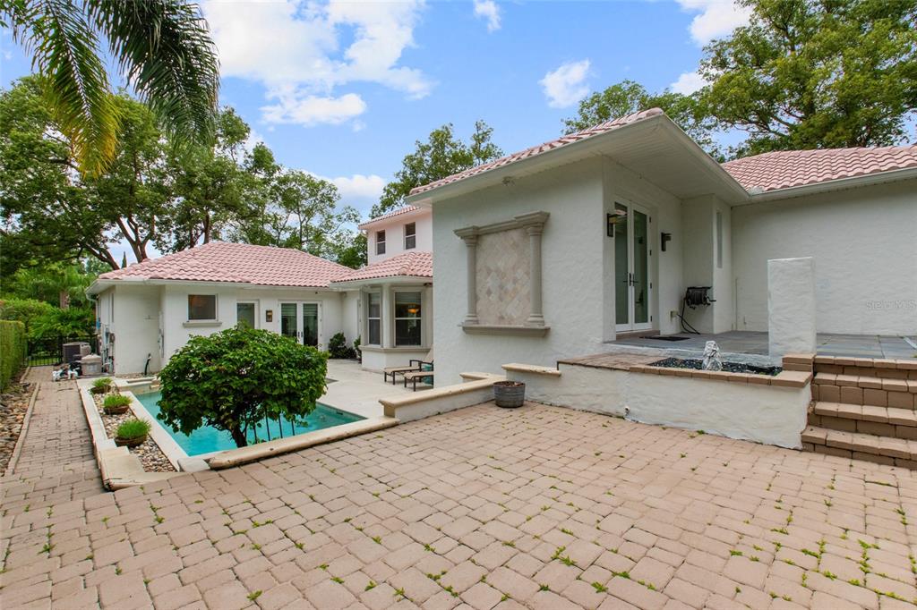 248 Maison Court Altamonte Springs, FL 32714 - Photo 38 of 47 a front view of a house with garden