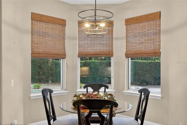 a bathroom with a granite countertop sink a mirror and a vanity