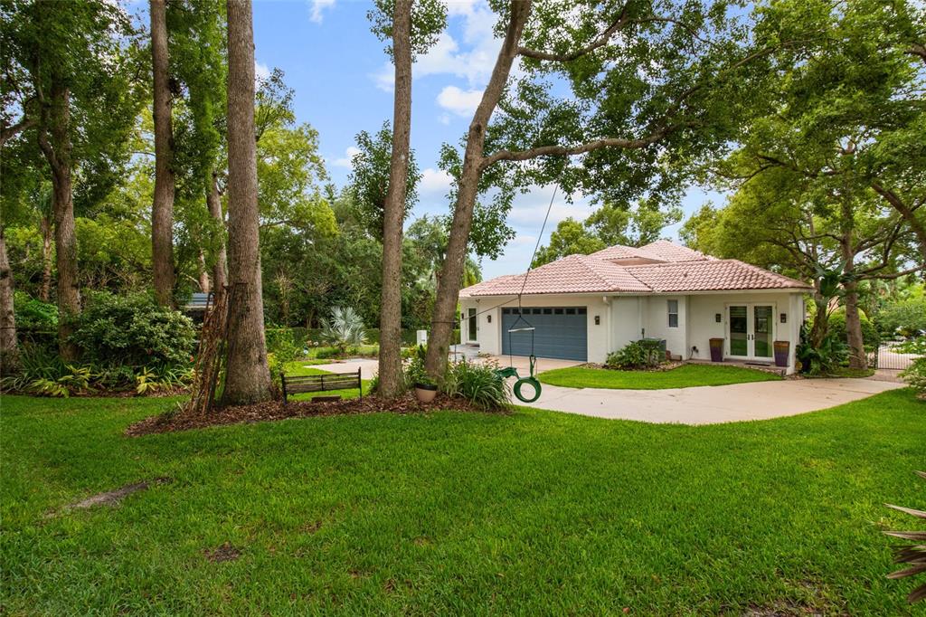 248 Maison Court Altamonte Springs, FL 32714 - Photo 43 of 47 a view of a house with a yard porch and sitting area