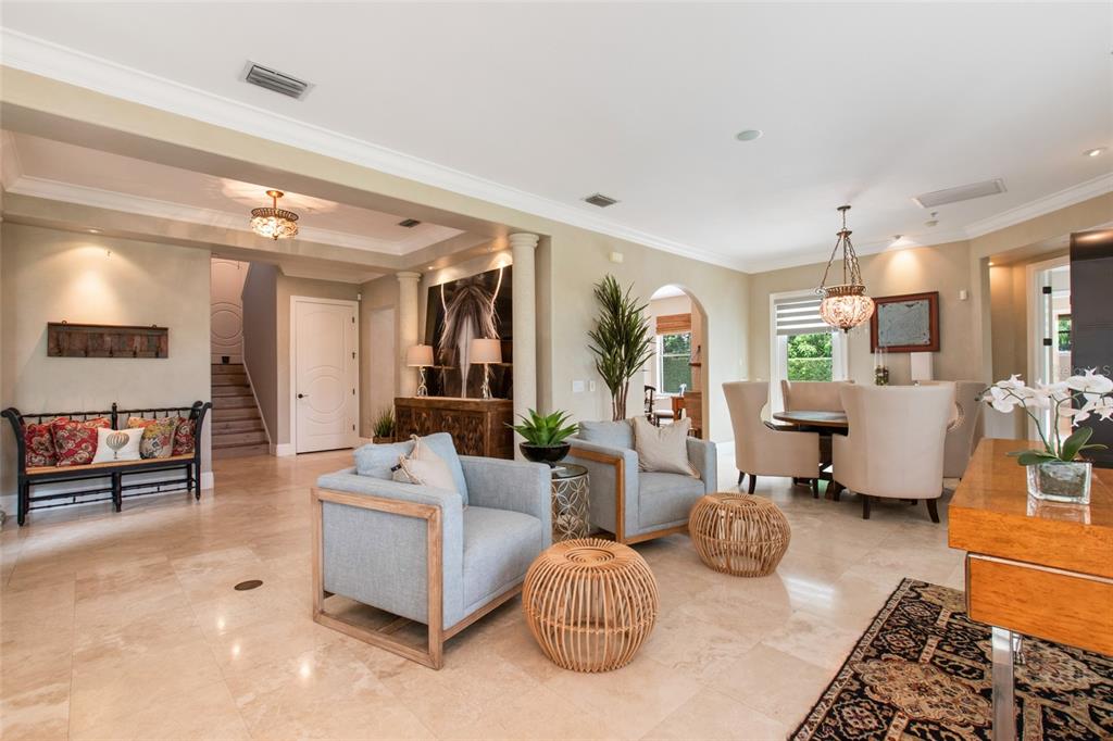 248 Maison Court Altamonte Springs, FL 32714 - Photo 5 of 47 a living room with furniture and a couch