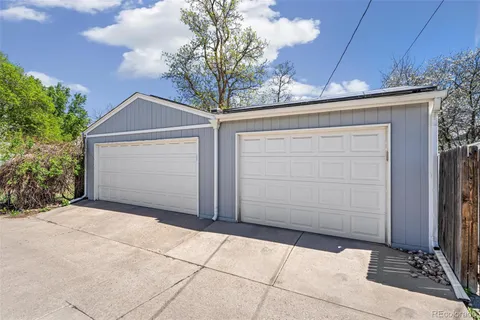 a front view of a house with a garage