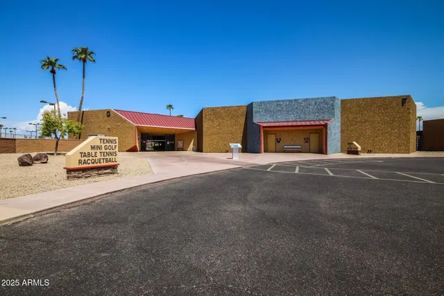 a view of a garden with swimming pool