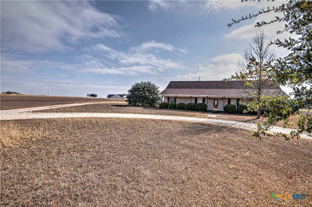 809 Hudson Lane Eddy, TX 76524 - Photo 3 of 48 a view of house with yard and ocean view