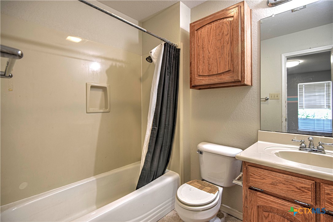 809 Hudson Lane Eddy, TX 76524 - Photo 36 of 48 a bathroom with a sink a toilet and shower