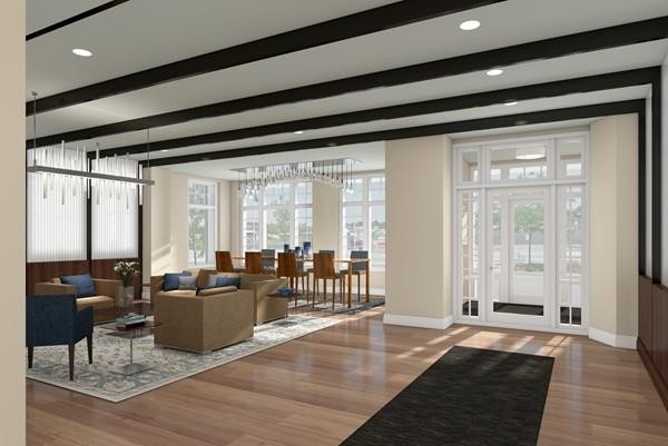 10 Shipyard Drive, Unit 511 Hingham, MA 02043 - Photo 2 of 6 a living room with furniture and large windows