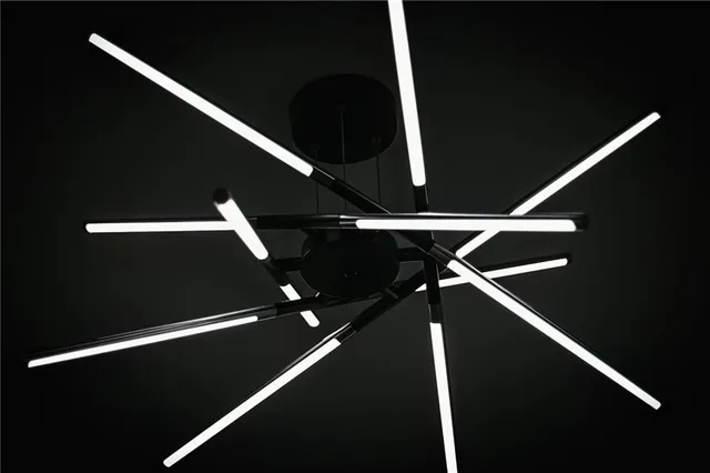 a bathroom with a sink a toilet and a shower