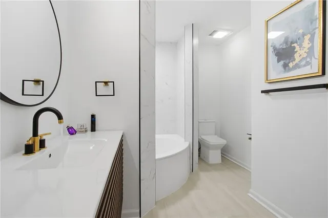 a bedroom with bed and a couch