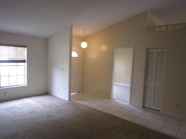 7408 Shell Ridge Terrace Lake Worth, FL 33467 - Photo 5 of 23 an empty room with windows and closet