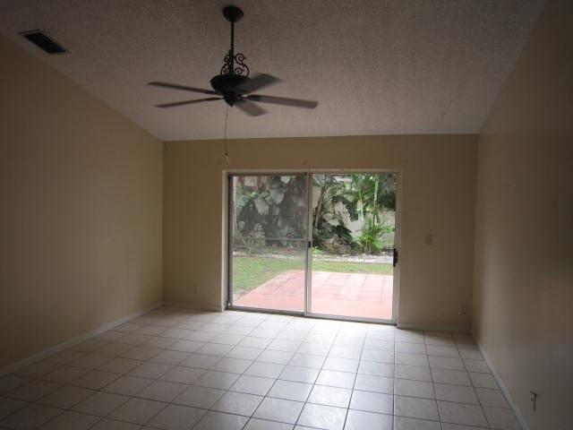 7408 Shell Ridge Terrace Lake Worth, FL 33467 - Photo 8 of 23 a view of an empty room with a window