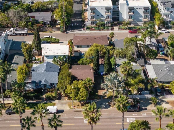 an aerial view of a city with lots of residential buildings