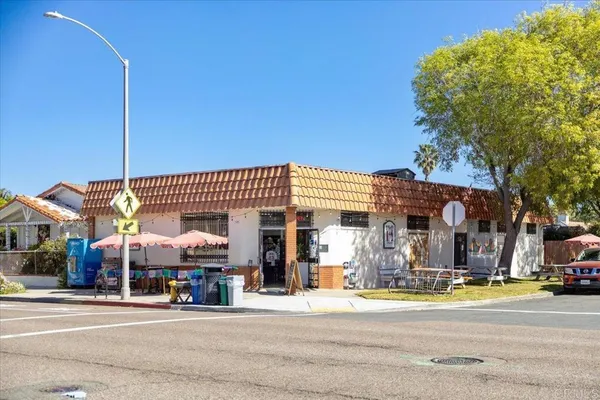 a sign that is on a brick wall