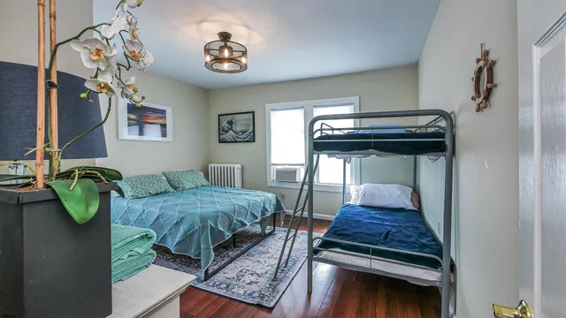 a bedroom with furniture and a bed