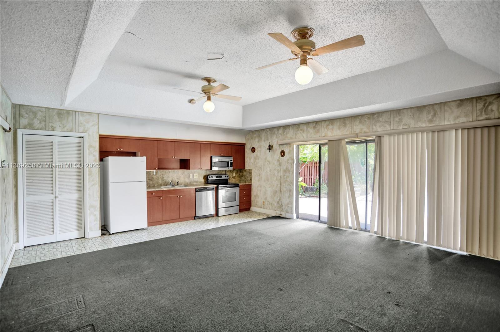 837 Washington Street Hollywood, FL 33019 - Photo 12 of 65 a view of an empty room with a window