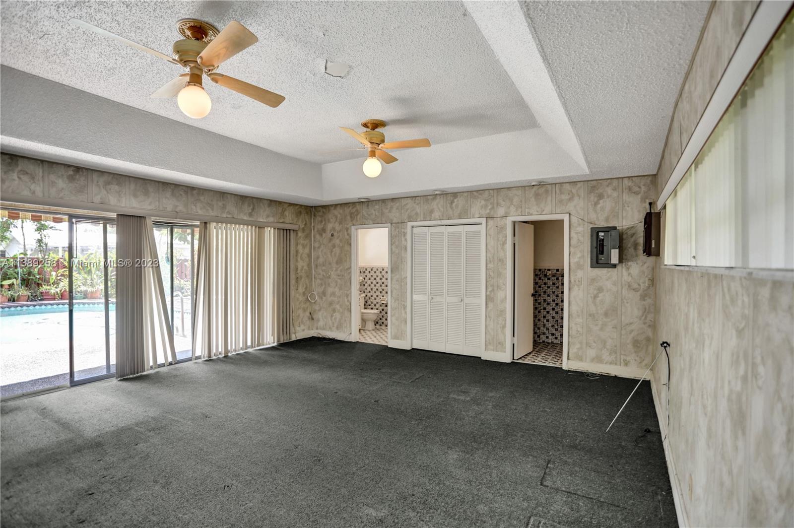 837 Washington Street Hollywood, FL 33019 - Photo 13 of 65 a view of an empty room with a window