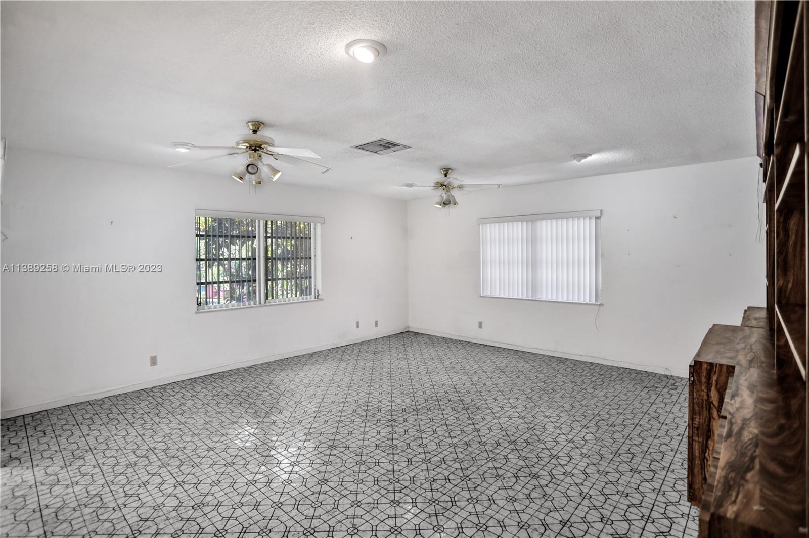 837 Washington Street Hollywood, FL 33019 - Photo 40 of 65 a view of an empty room with a window
