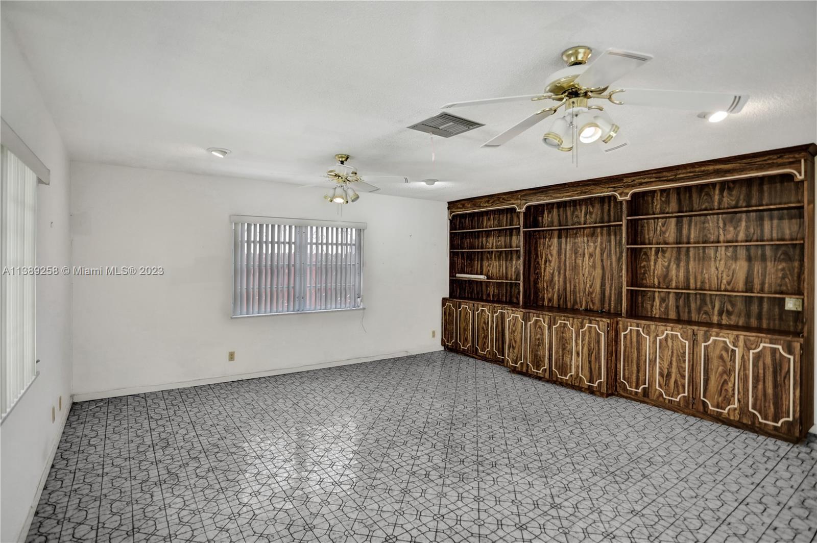 837 Washington Street Hollywood, FL 33019 - Photo 41 of 65 a view of an empty room with a window
