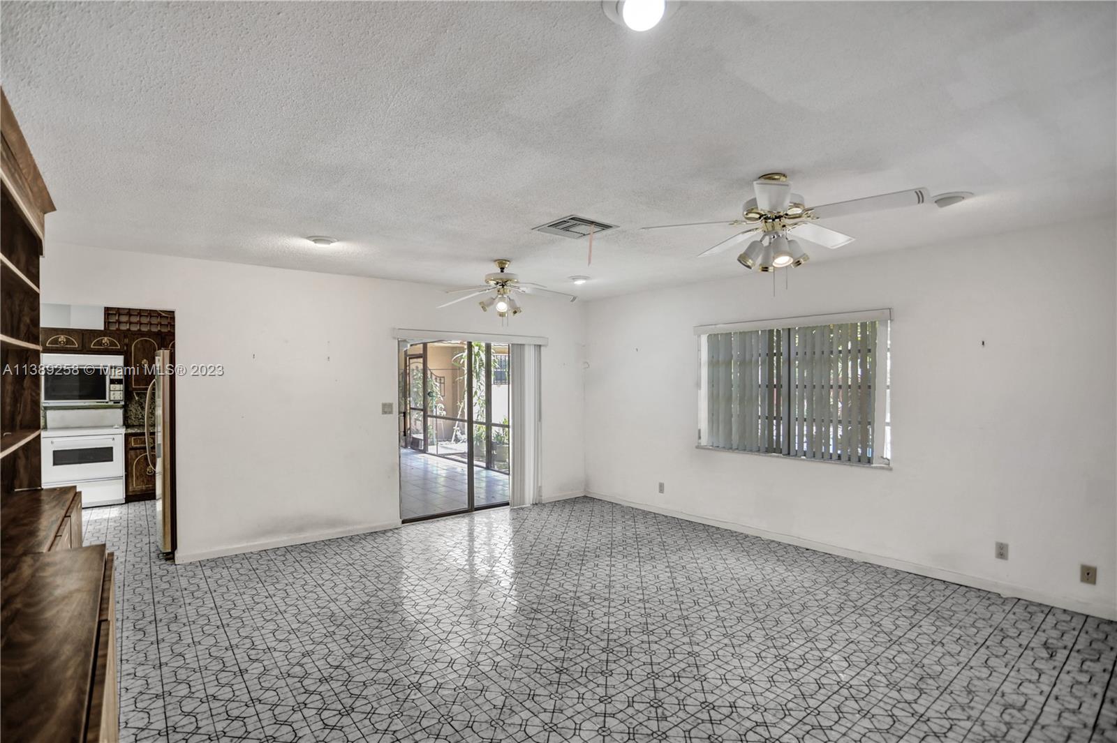 837 Washington Street Hollywood, FL 33019 - Photo 43 of 65 a view of an empty room with a window