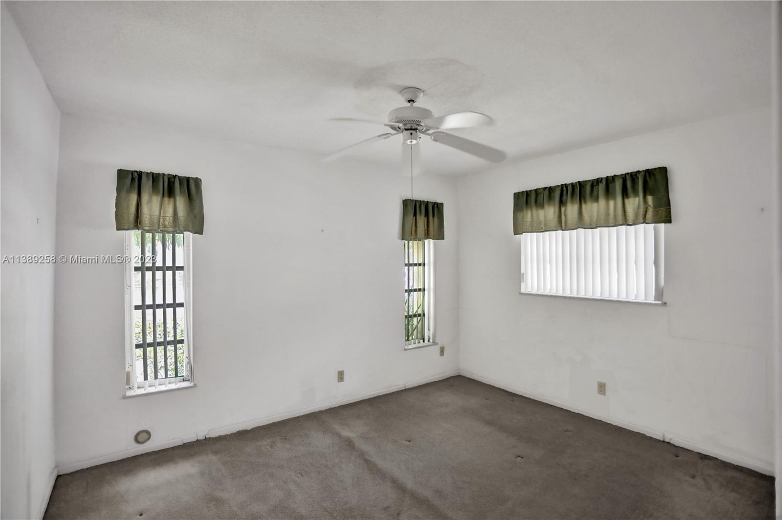 837 Washington Street Hollywood, FL 33019 - Photo 44 of 65 a view of an empty room with a window