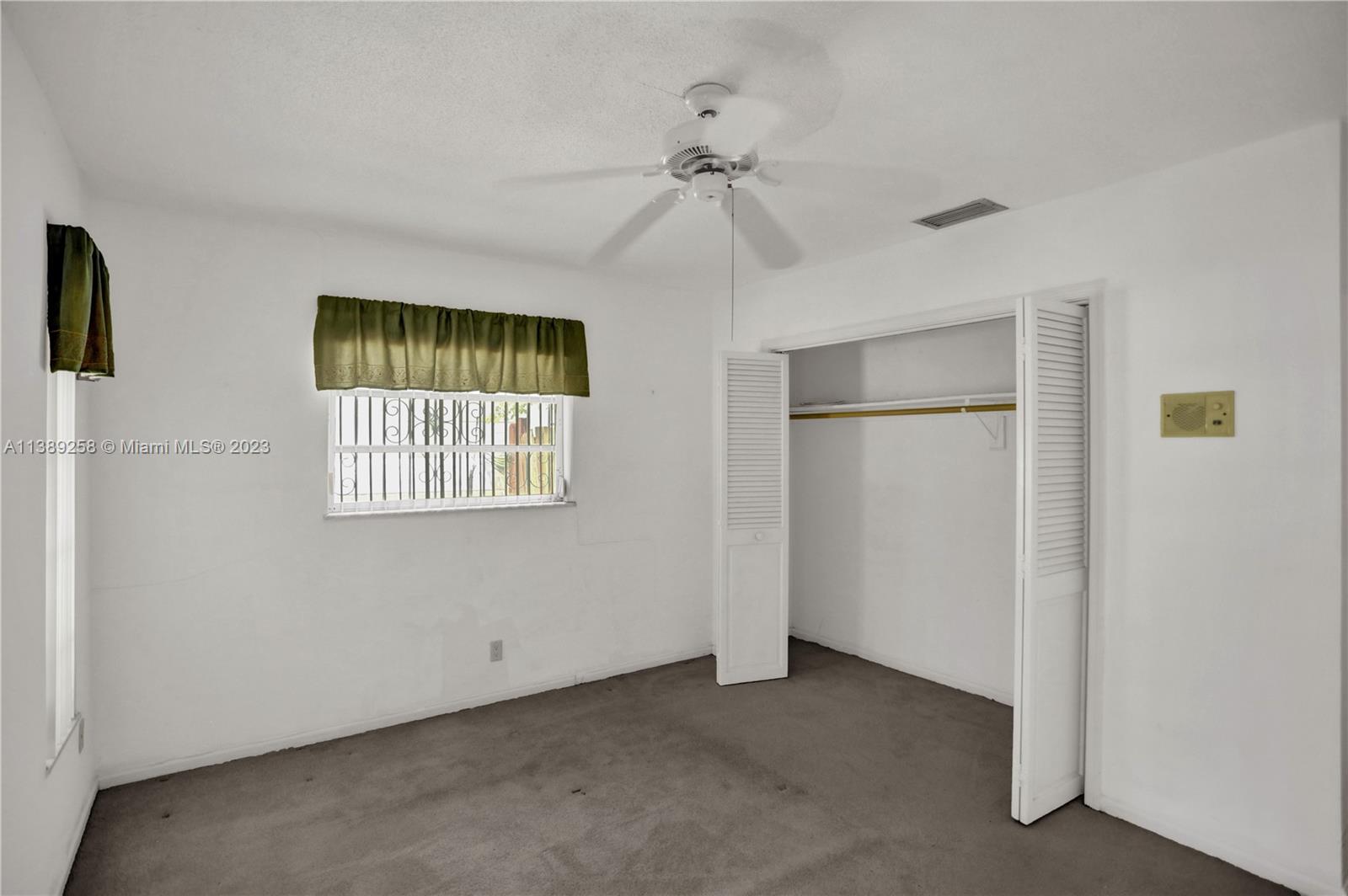 837 Washington Street Hollywood, FL 33019 - Photo 45 of 65 a view of an empty room with a window