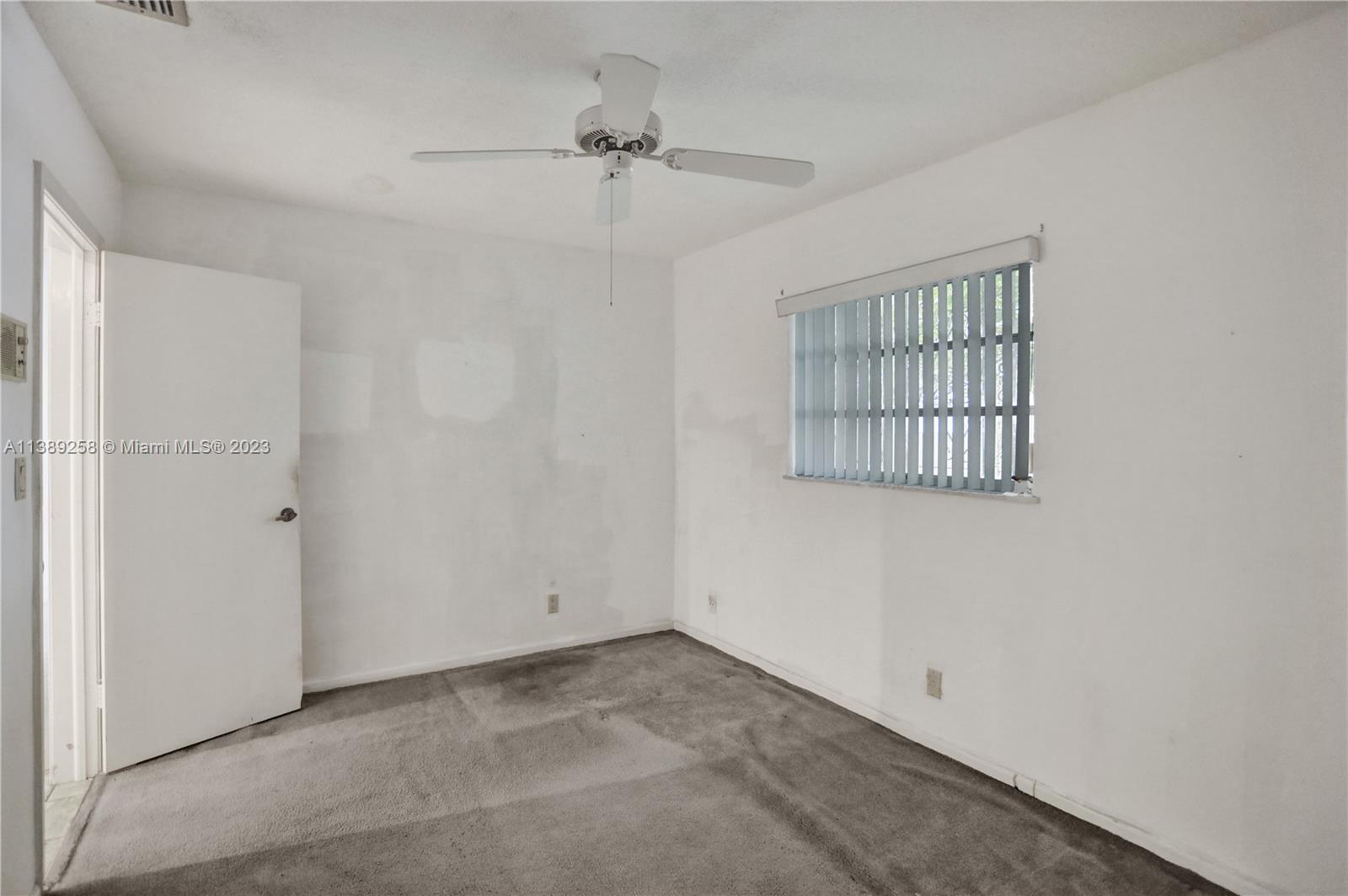 837 Washington Street Hollywood, FL 33019 - Photo 51 of 65 an empty room with windows