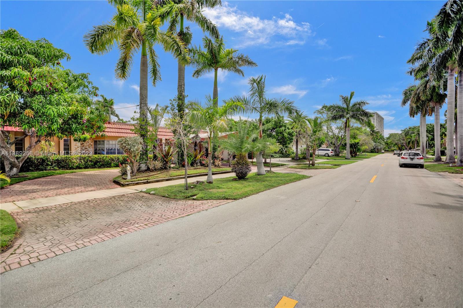 837 Washington Street Hollywood, FL 33019 - Photo 65 of 65 a view of a street with a building in the background