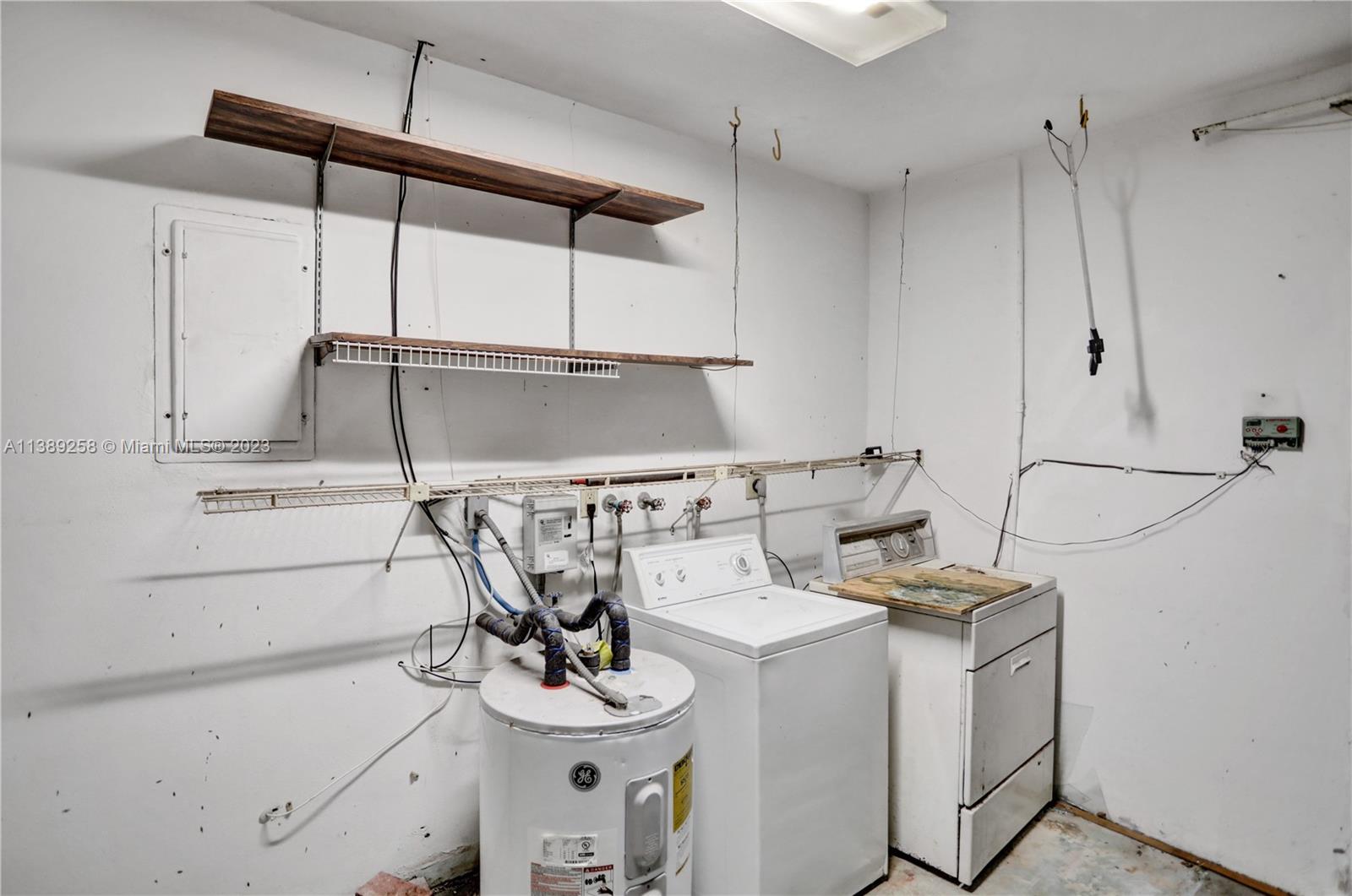 837 Washington Street Hollywood, FL 33019 - Photo 10 of 65 a bathroom with a sink a toilet and shower