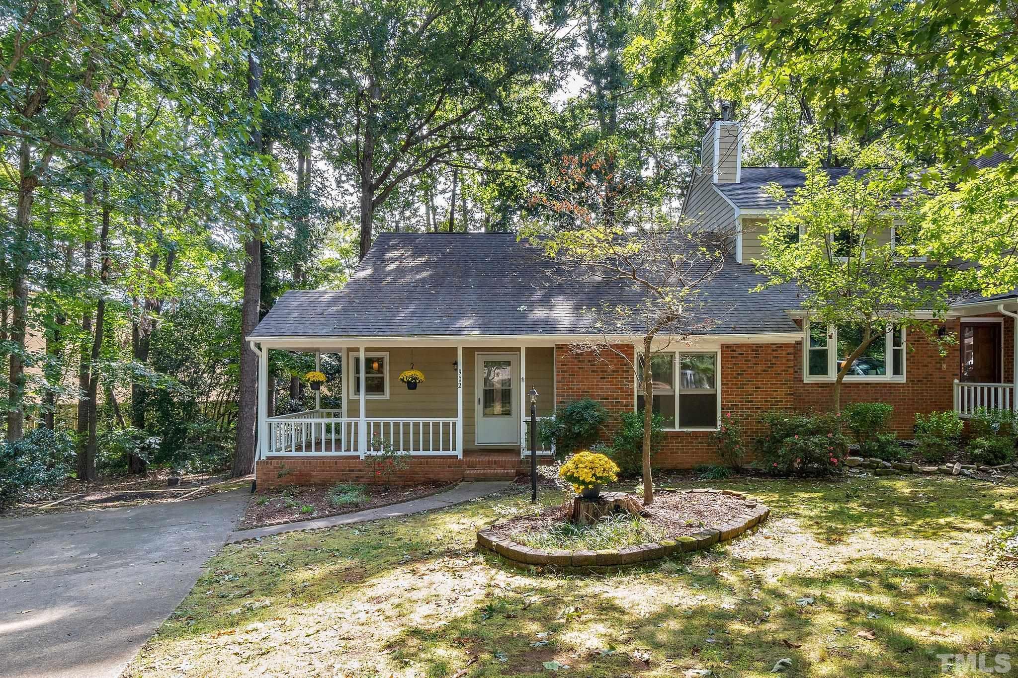 902 Bridge Way Raleigh, NC 27615 - Photo 1 of 27 a front view of house with yard outdoor seating and barbeque oven