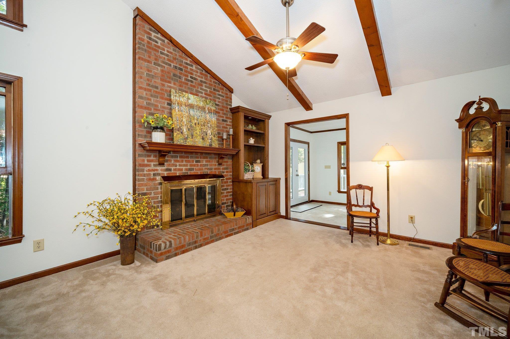 902 Bridge Way Raleigh, NC 27615 - Photo 11 of 27 a view of a livingroom with furniture and a ceiling fan
