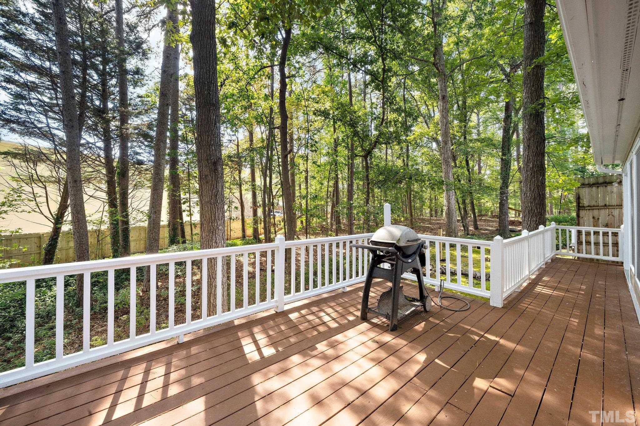902 Bridge Way Raleigh, NC 27615 - Photo 20 of 27 a view of a bench in the backyard