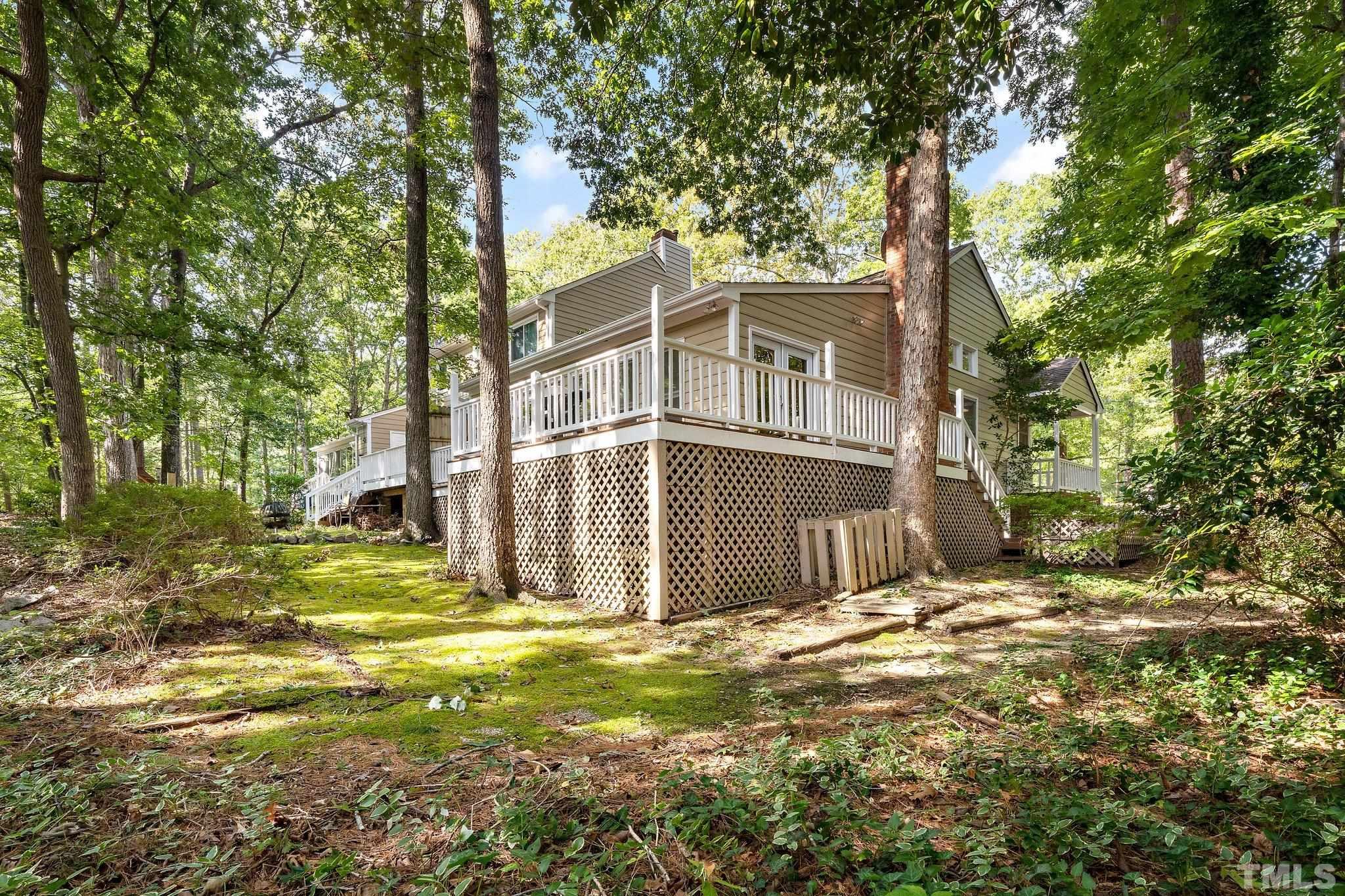 902 Bridge Way Raleigh, NC 27615 - Photo 24 of 27 a view of a house with a large tree
