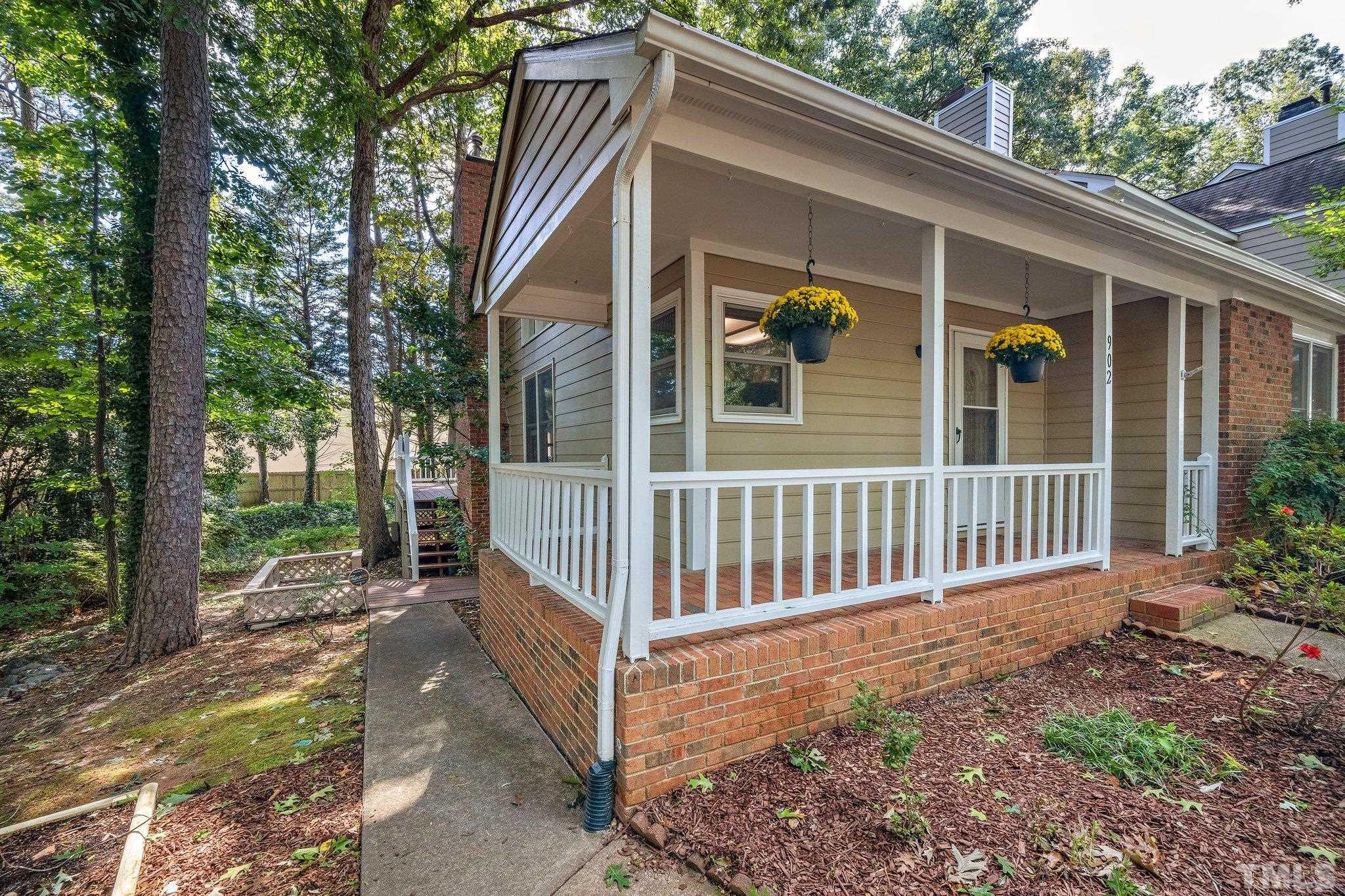 902 Bridge Way Raleigh, NC 27615 - Photo 4 of 27 a view of a house with backyard and porch