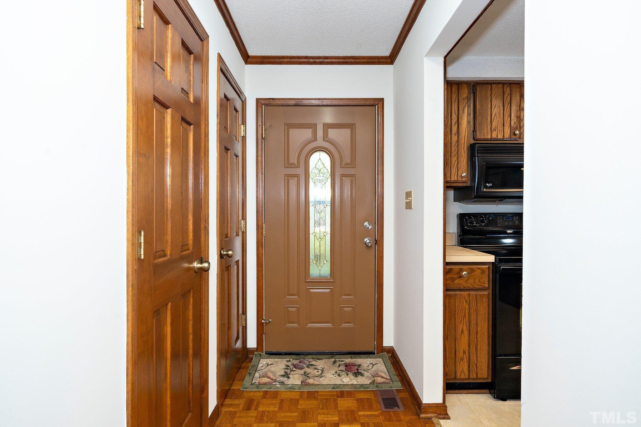902 Bridge Way Raleigh, NC 27615 - Photo 6 of 27 a view of an entryway door