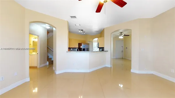 a bathroom with a glass shower door and a bathtub