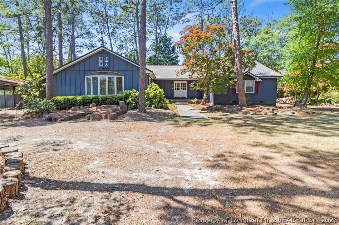 5605 MacGregor Court Fayetteville, NC 28304 - Photo 1 of 49 a front view of a house with a yard