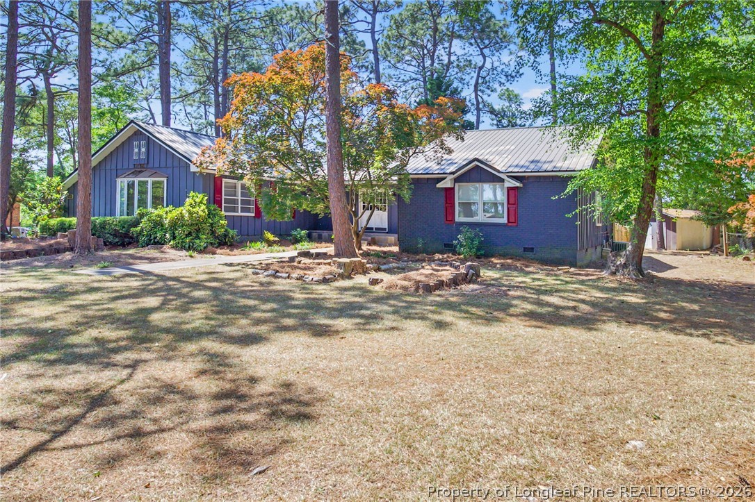 5605 MacGregor Court Fayetteville, NC 28304 - Photo 2 of 49 a view of a house with a yard