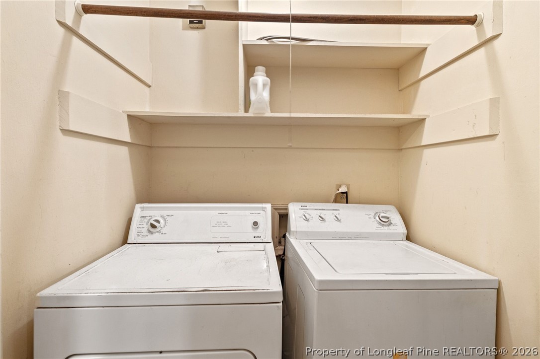 5605 MacGregor Court Fayetteville, NC 28304 - Photo 21 of 49 a utility room with dryer and washer
