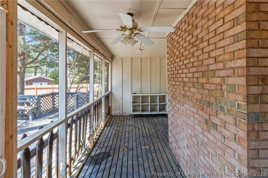5605 MacGregor Court Fayetteville, NC 28304 - Photo 41 of 49 a view of a room with wooden floor fan and windows