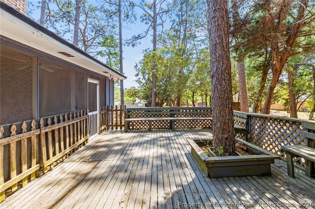 5605 MacGregor Court Fayetteville, NC 28304 - Photo 43 of 49 a view of balcony with wooden floor and outdoor seating