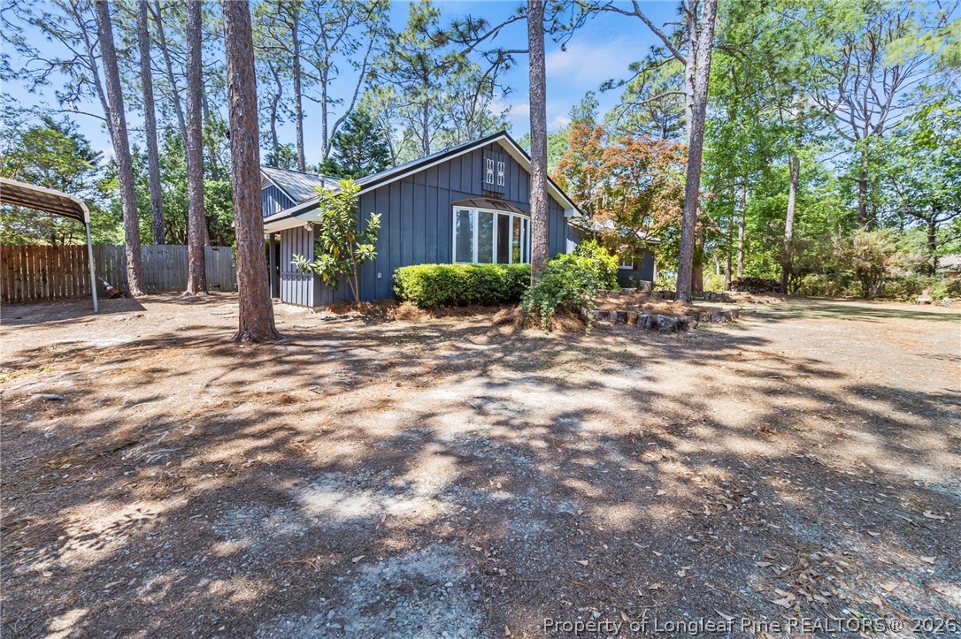 5605 MacGregor Court Fayetteville, NC 28304 - Photo 48 of 49 a view of a house with a tree in the background