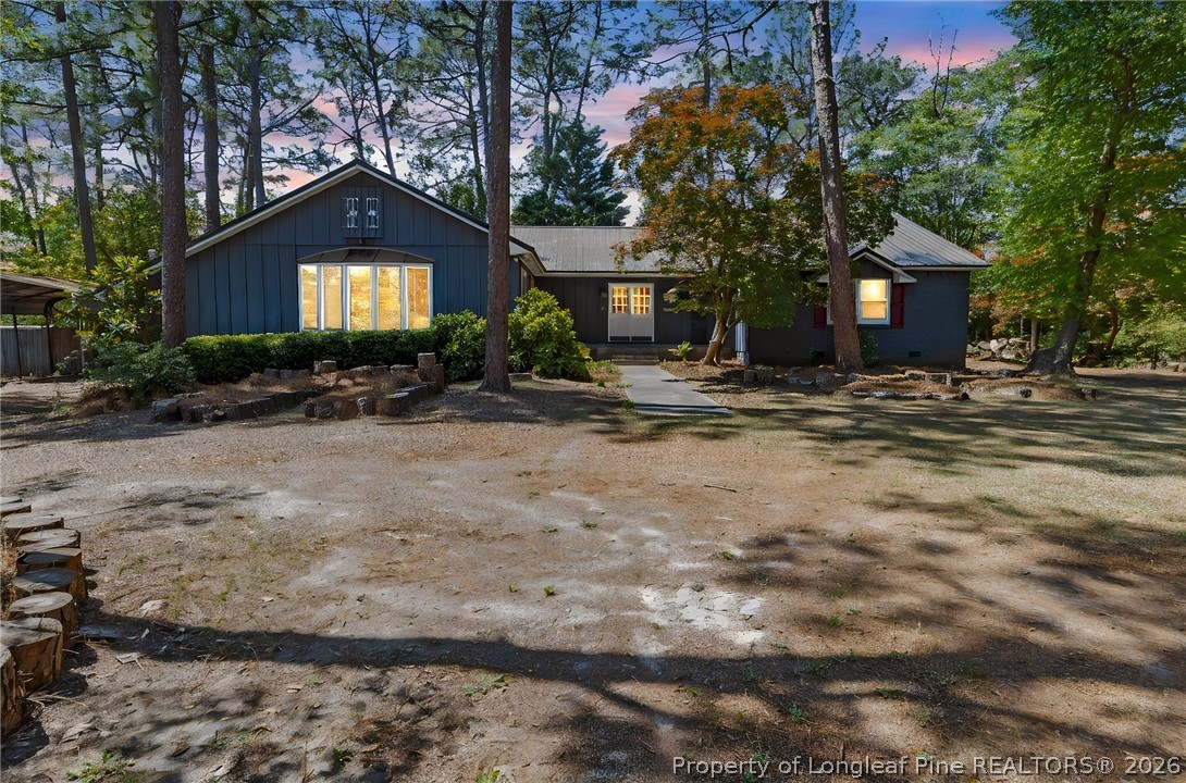 5605 MacGregor Court Fayetteville, NC 28304 - Photo 49 of 49 a front view of a house with a yard