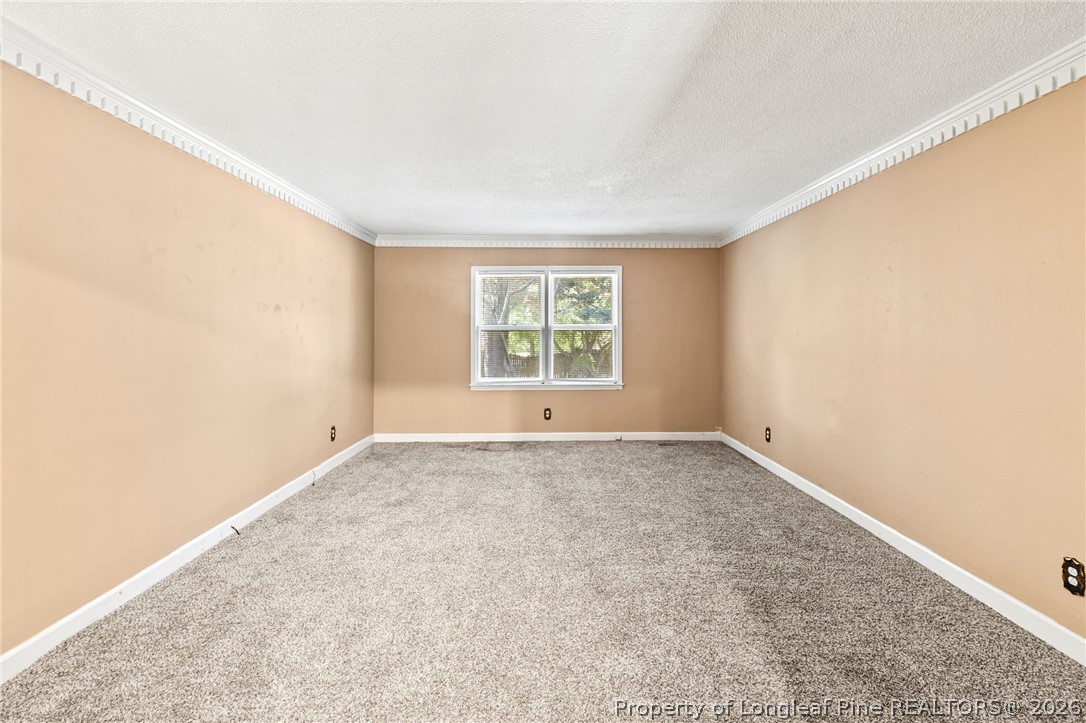 5605 MacGregor Court Fayetteville, NC 28304 - Photo 5 of 49 an empty room with a window