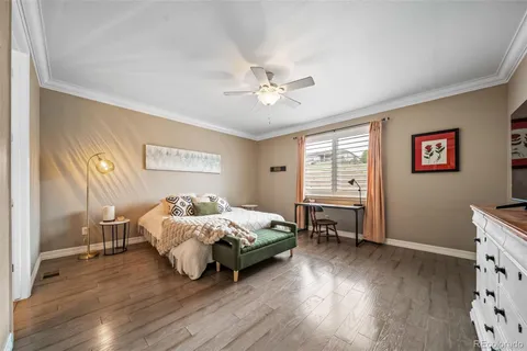 a bedroom with a bed and a table in it