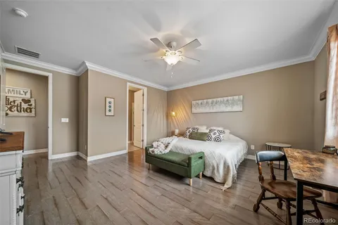 a bedroom with a bed and a table in it