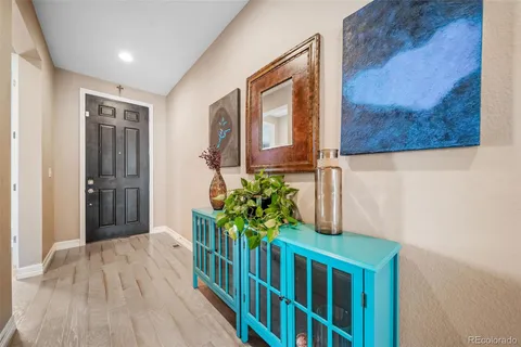 a view of entryway with wooden floor
