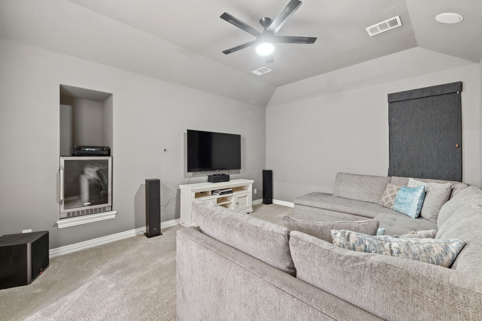 1124 Castle Path Round Rock, TX 78681 - Photo 27 of 40 A contemporary media room designed for ultimate comfort and entertainment.