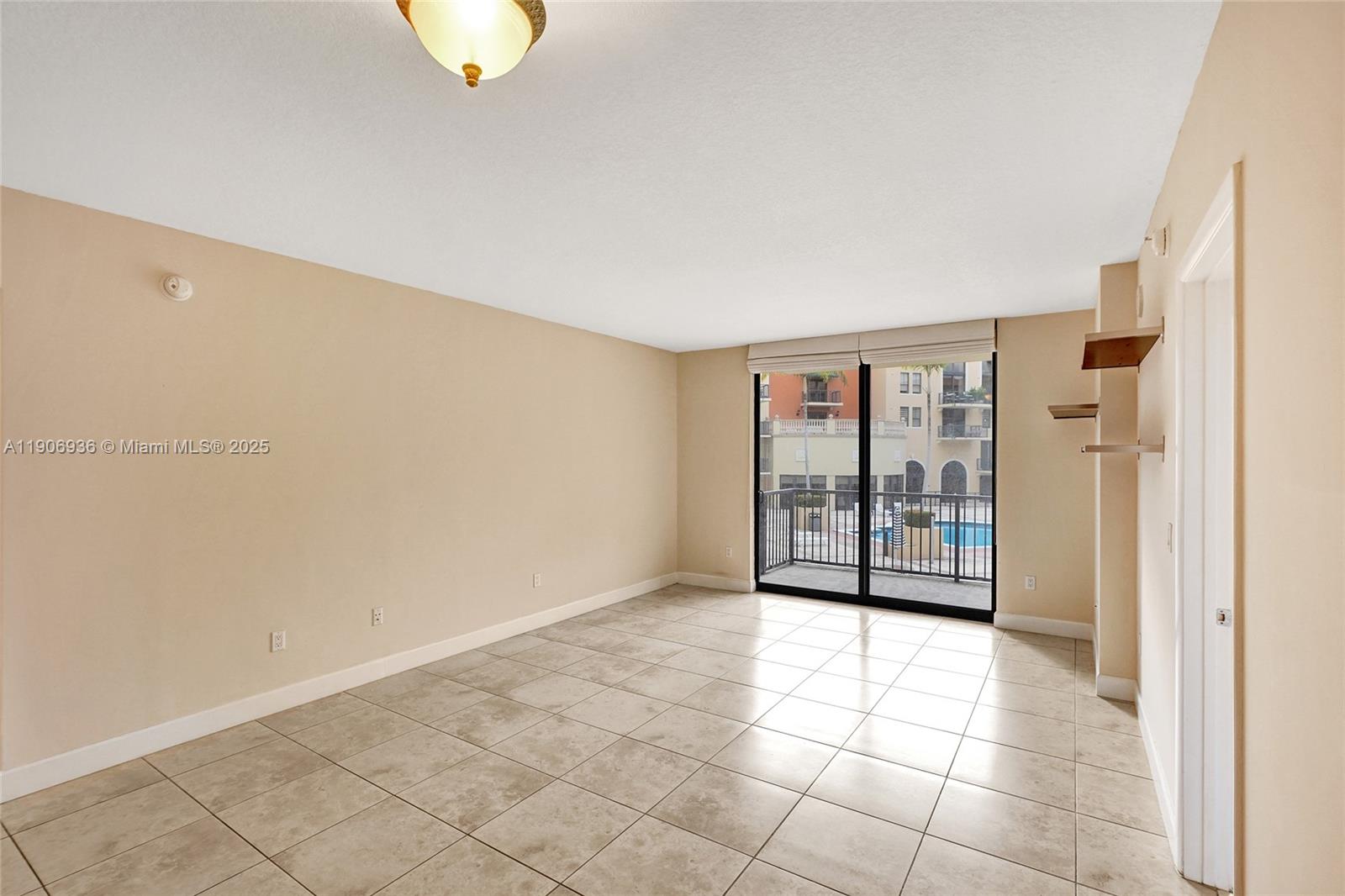 55 Merrick Way, Unit 619 Coral Gables, FL 33134 - Photo 13 of 40 a view of an empty room with a window