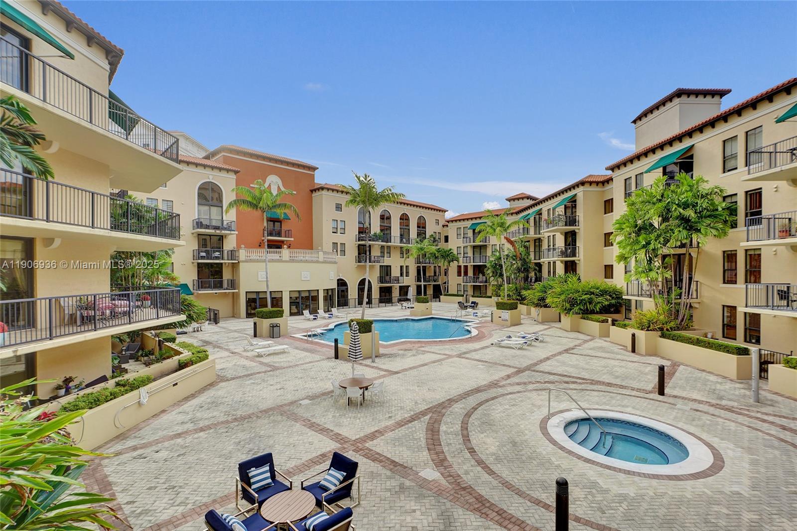 55 Merrick Way, Unit 619 Coral Gables, FL 33134 - Photo 2 of 40 a view of a house with backyard and sitting area