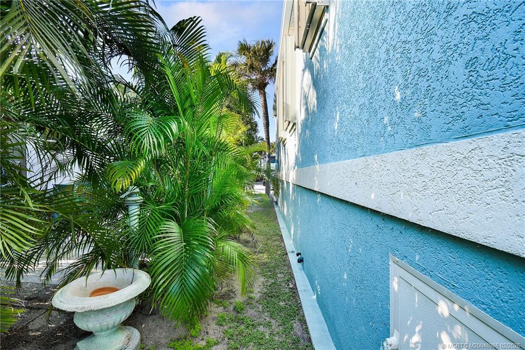 10725 South Ocean Drive, Unit 214 Jensen Beach, FL 34957 - Photo 36 of 90 a view of outdoor space and garden